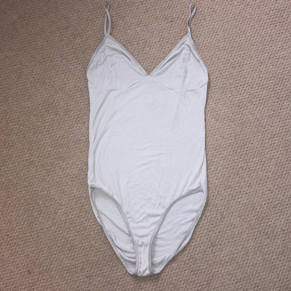 Light pink body suit